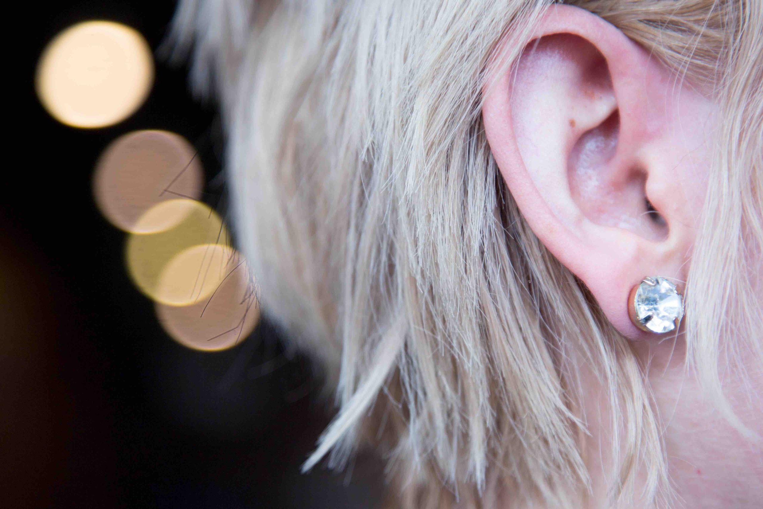 Ear with round crystal earring