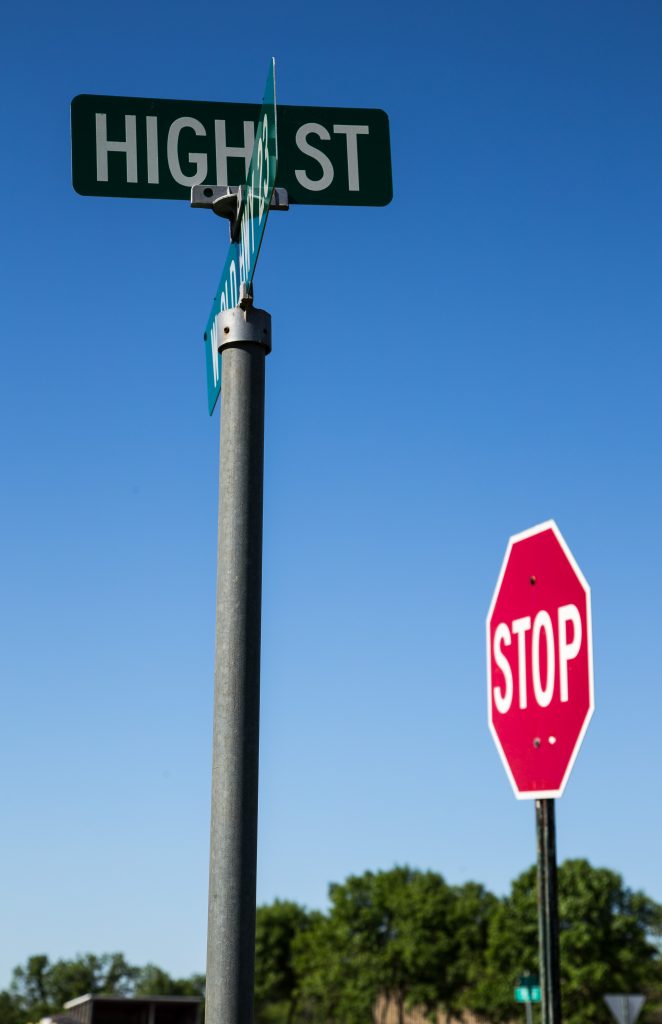 High St street sign and stop sign