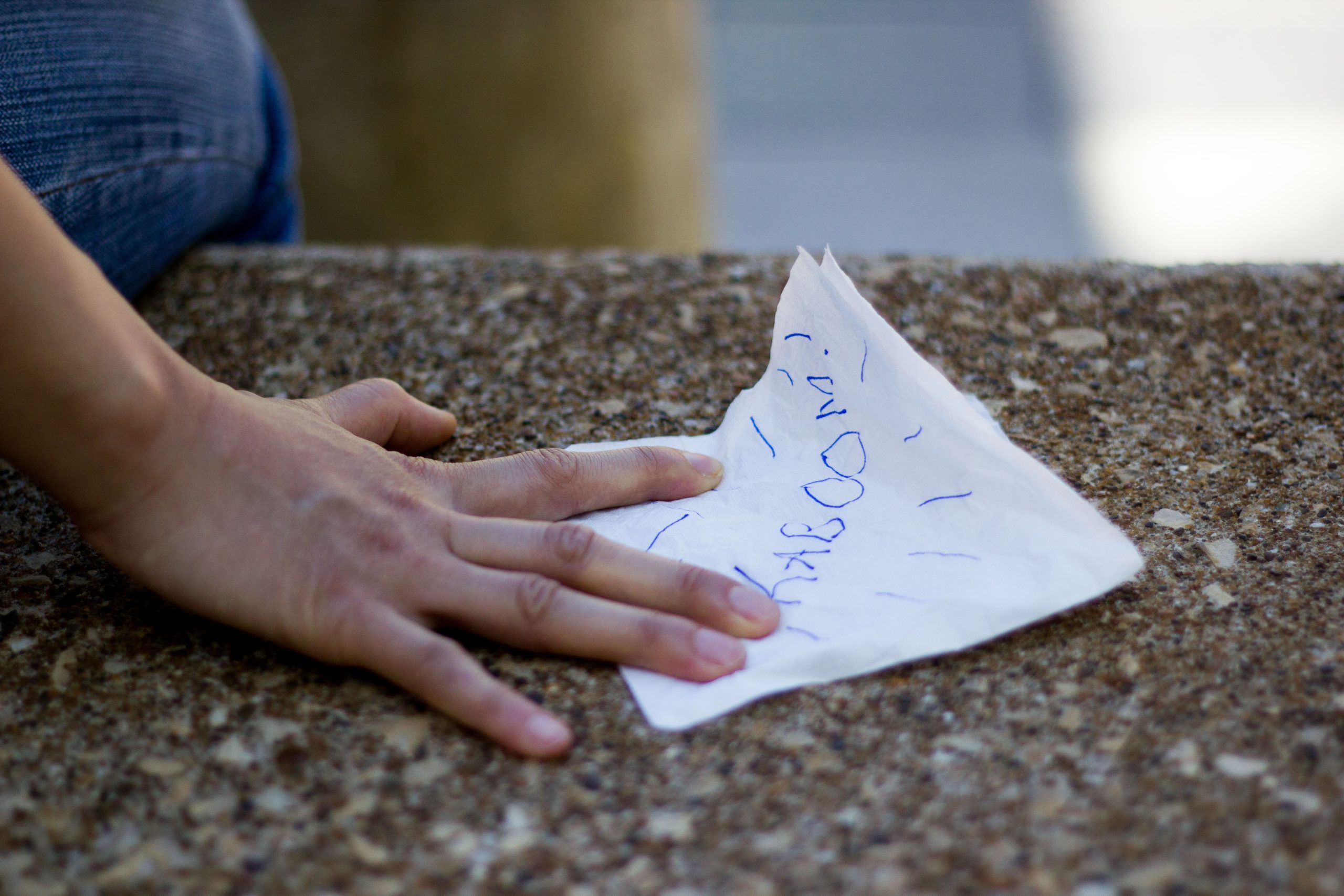 Napkin with Kaboom written in ink
