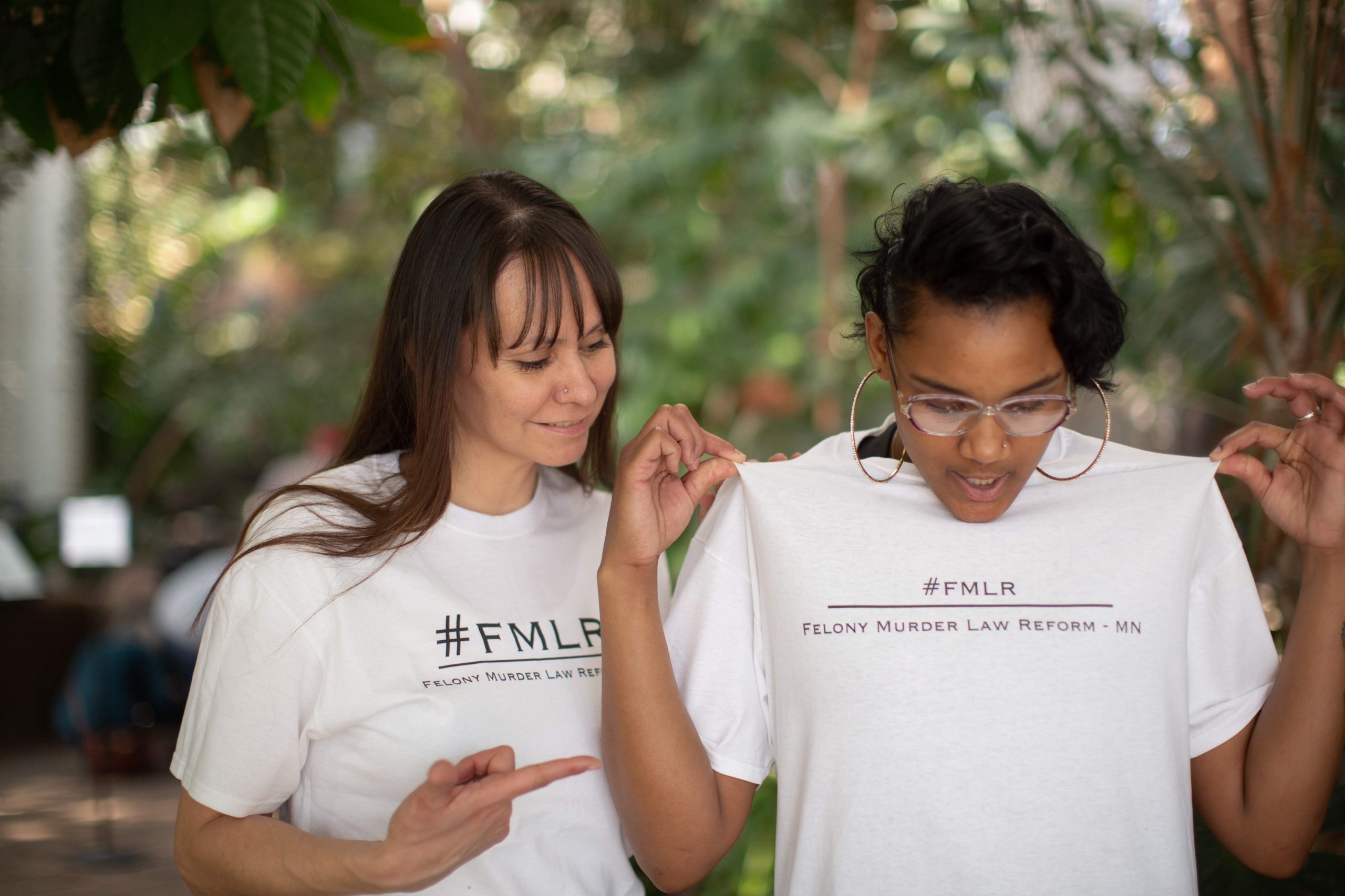 Louise and Sadie, posing with FMLR shirts on