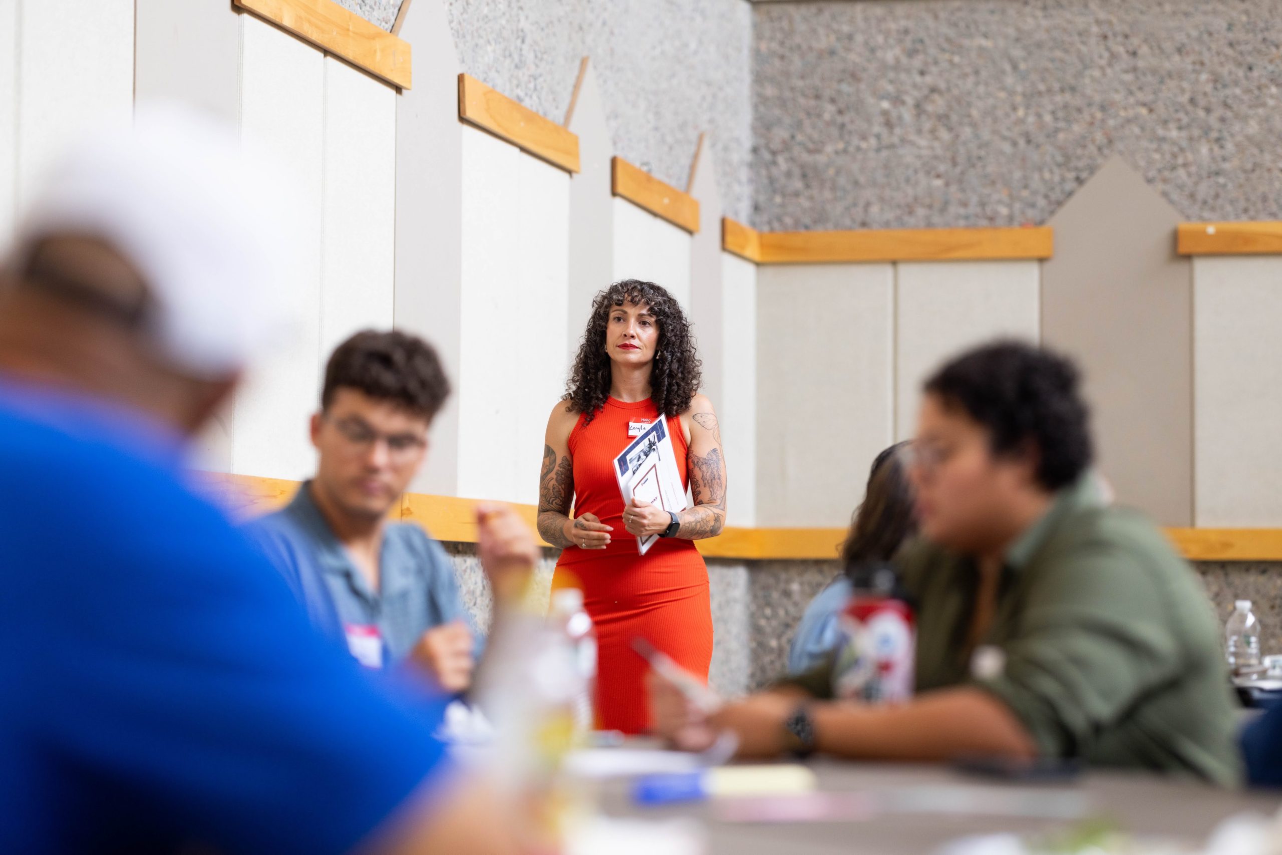 Kayla Richardson standing before an audience